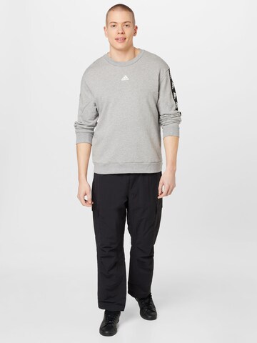 ADIDAS SPORTSWEAR - Sweatshirt de desporto 'Brand Love' em cinzento