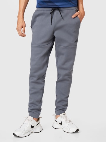 new balance Tapered Sports trousers in Grey: front