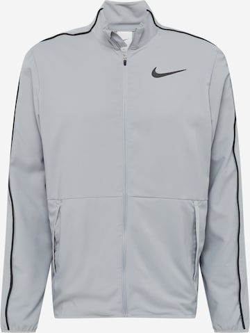 NIKE - Sudadera con cremallera deportiva en gris: frente