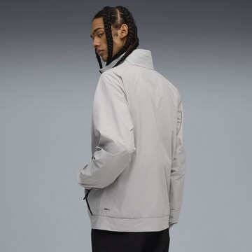 PUMA Sportsweatshirt 'Pumatech' in Grijs