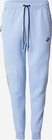 Tapered Pantaloni di Nike Sportswear in blu: frontale