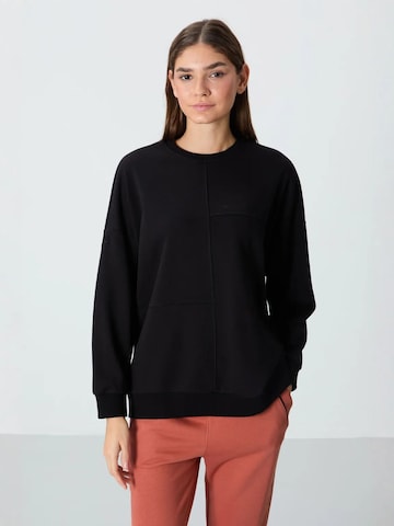 Sweat-shirt Tommy Life en noir : devant