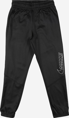 NIKE Tapered Sports trousers in Black: front