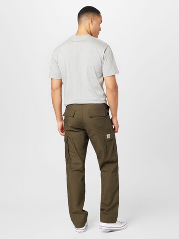 Carhartt WIP Regularen Kargo hlače | zelena barva