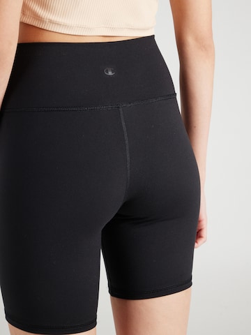 Skinny Pantaloni sportivi di Champion Authentic Athletic Apparel in nero