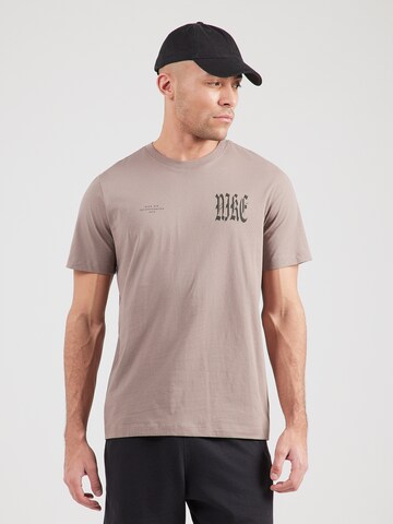 T-Shirt 'WE FLOAT' Nike Sportswear en marron