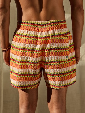 Pantaloncini da bagno di Next in arancione