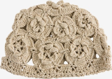 Chapeaux Next en or : devant