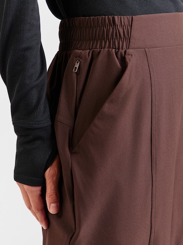 Fabletics Zvonové kalhoty Sportovní kalhoty 'DOWNTOWN' – hnědá