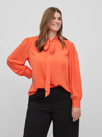 EVOKED - Blusa 'KAYA' en naranja: frente