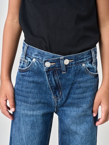 Jean Deeluxe en bleu