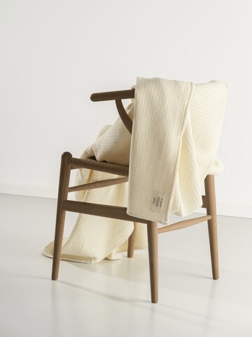 Couvertures 'Cosy Occasion Oversize' Cradle Studio en jaune : devant