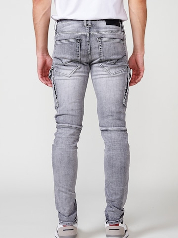 Skinny Pantaloni eleganți de la KOROSHI pe gri