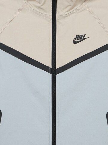 Nike Sportswear Between-season jacket in Grey