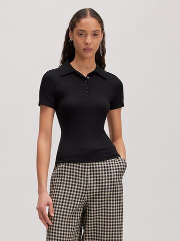 EDITED Poloshirt 'Vania' in Schwarz: Vorderseite