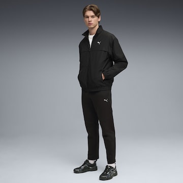 PUMA Regular Workout Pants 'Evostripe' in Black