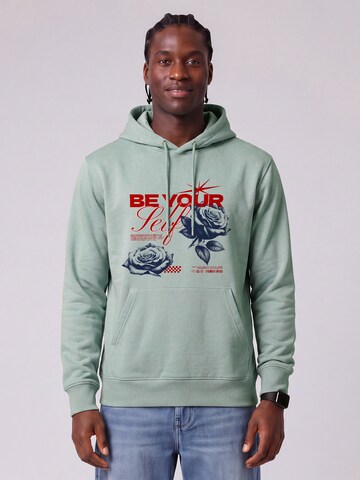 Felpa 'Be yourself' di Watapparel in verde: frontale