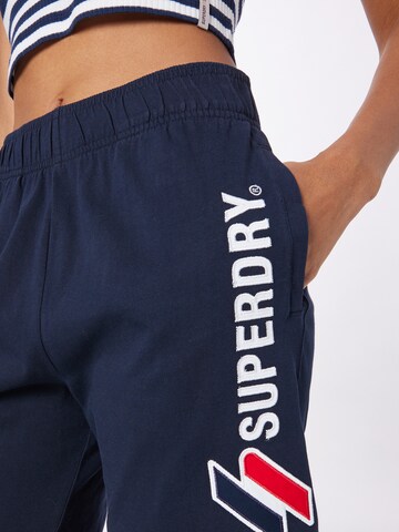 Superdry Loose fit Trousers 'Code' in Blue