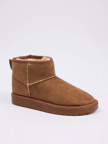 Botine de la Trendyol pe maro: față