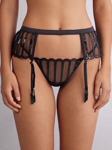 INTIMISSIMI Strumpfhalter 'SEE THE MAGIC' in Schwarz: Vorderseite