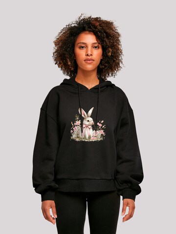 F4NT4STIC Sweatshirt 'Niedlicher Osterhase Mit Blumen' in Zwart: voorkant