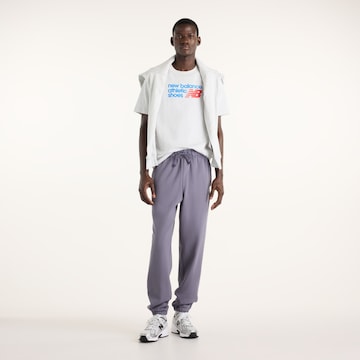 Loosefit Pantaloni 'Athletics French Terry Jogger' di new balance in lilla