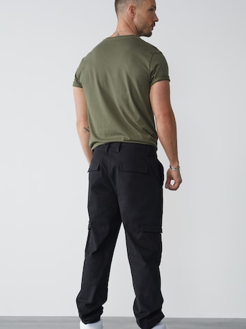 DAN FOX APPAREL Tapered Cargobroek 'Damon' in Zwart