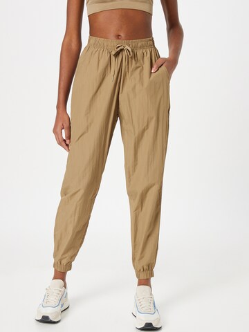 Athlecia Regular Workout Pants 'THARBIA' in Brown: front
