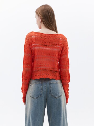 Pull-over OXXO en orange