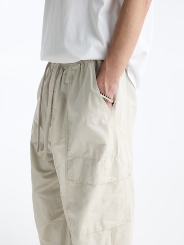Pull&Bear Wide Leg Gargohousut värissä valkoinen