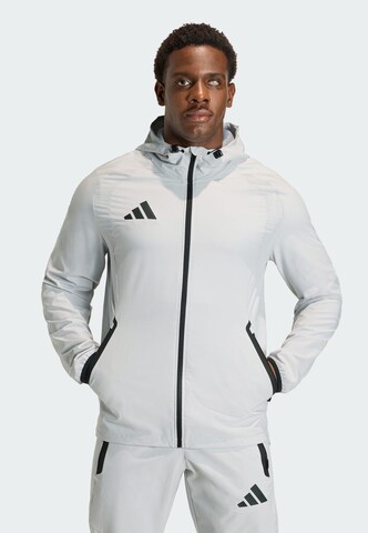 Veste de sport 'Tiro Travel' ADIDAS PERFORMANCE en gris : devant