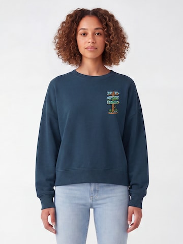 Felpa 'Adventure is everywhere' di Watapparel in verde: frontale