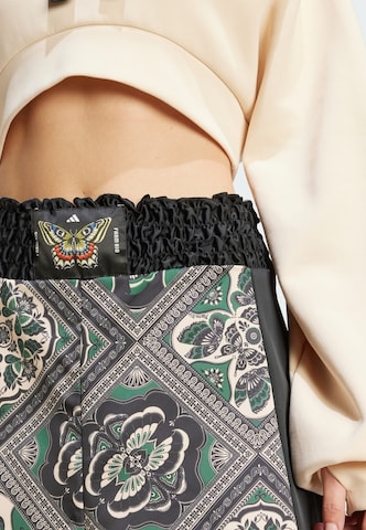 Loosefit Pantaloni sportivi 'Adidas x Farm' di ADIDAS SPORTSWEAR in nero