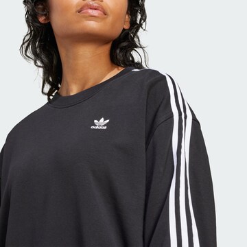 Bluză de molton de la ADIDAS ORIGINALS pe negru