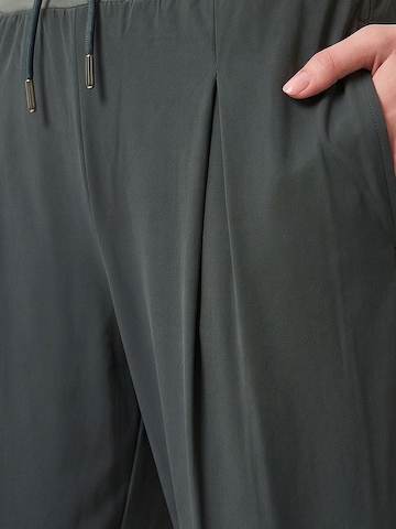 Pantaloni di Tommy Life in verde