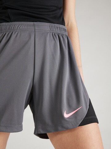 NIKE - regular Pantalón deportivo 'STRIKE' en gris
