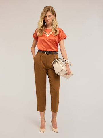 MOTIVI Top in Oranje