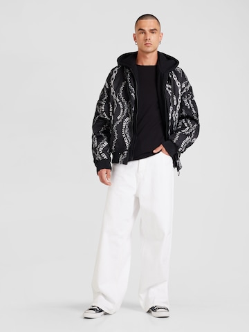 Geacă de primăvară-toamnă de la Versace Jeans Couture pe negru