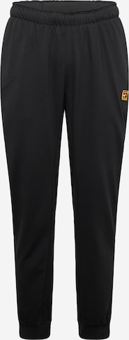 NIKE Конический (Tapered) Спортивные штаны в Черный: спереди