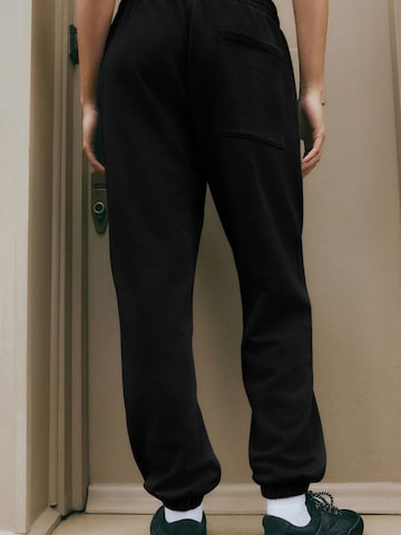 Next - Tapered Pantalón en negro
