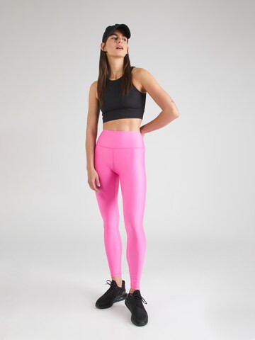 UNDER ARMOURSkinny Sportske hlače 'Evolved' - roza boja