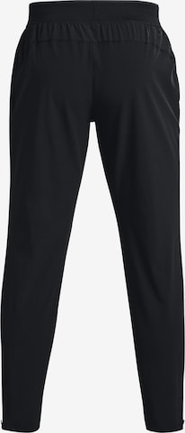 Effilé Pantalon de sport UNDER ARMOUR en noir