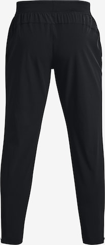 Tapered Pantaloni sportivi di UNDER ARMOUR in nero