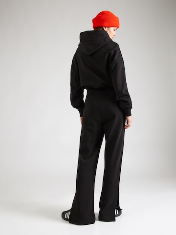 Calvin Klein JeansFlared/zvonoliki kroj Hlače - crna boja
