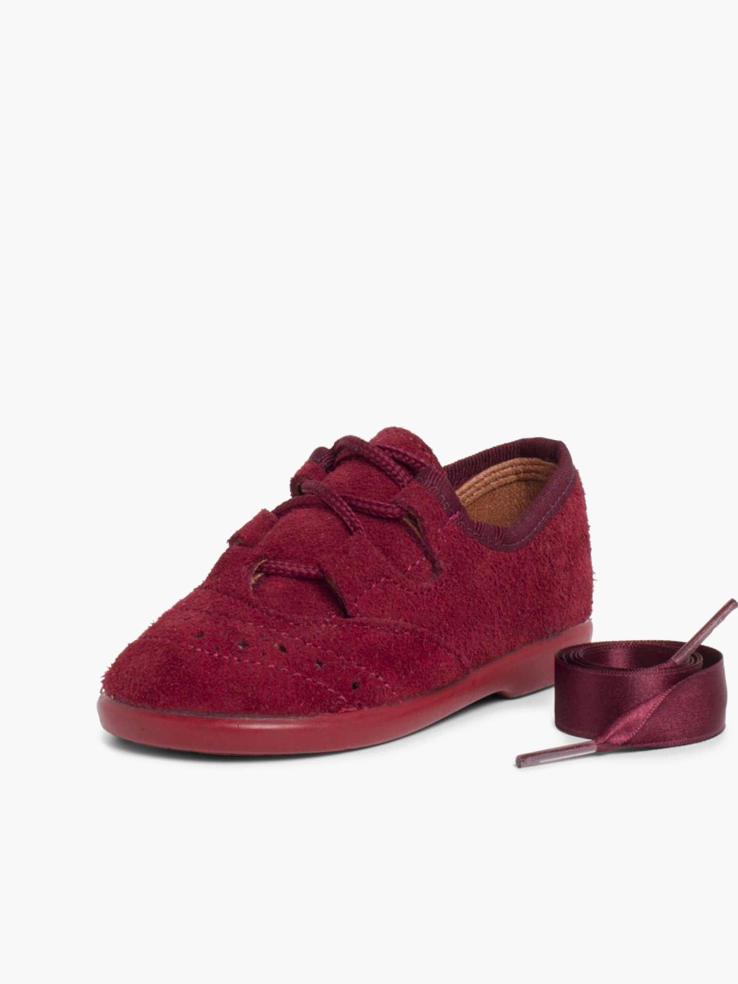 Scarpa bassa di Pisamonas in rosso: frontale