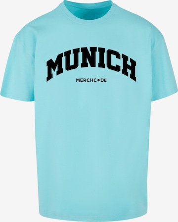 Merchcode T-Shirt 'Munich Wording' in Blau: Vorderseite