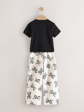 juoda Next Miego kostiumas