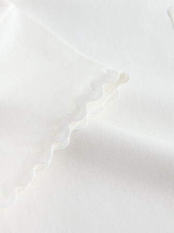 T-Shirt Next en blanc