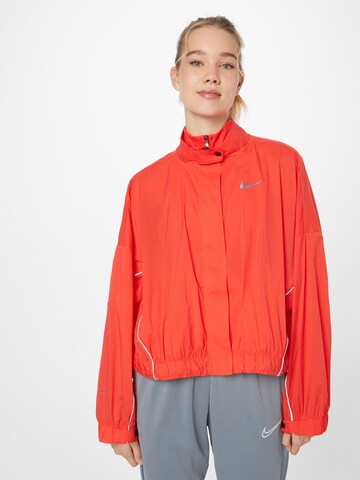 Veste de sport NIKE en rouge : devant