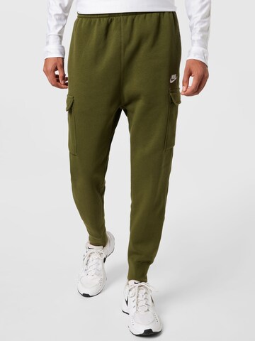 Pantaloni de la Nike Sportswear pe verde: față